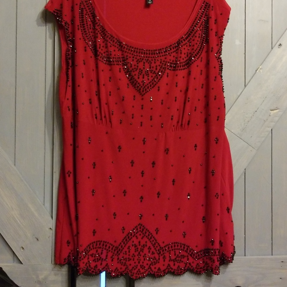 Beautiful,  fancy top. Detailed with black beading